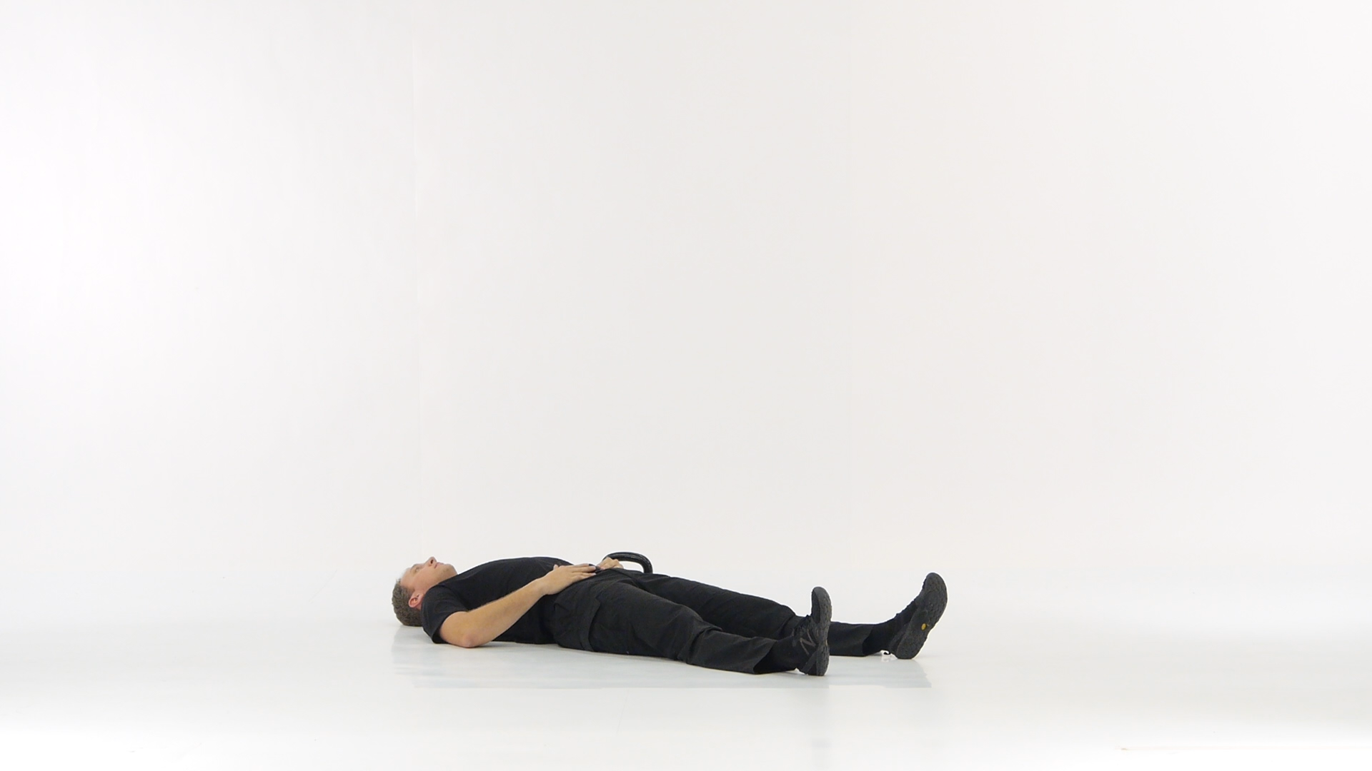 Get-up Post to High Pelvis with One KB | Functional Movement Systems